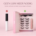 Kist met 5 paar magnetische valse wimpers, applicator en eyeliner, naast een roze flesje lijm met rood kruis.