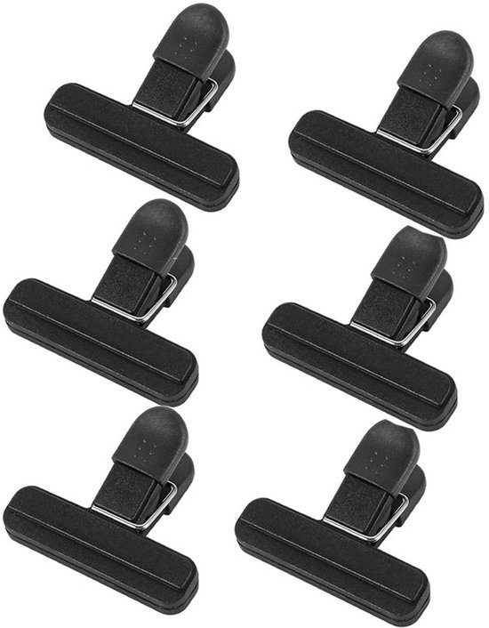 Zes zwarte, plastic sluitclips met metalen veermechanisme.