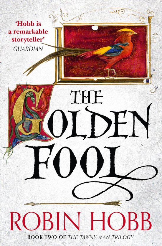 Boekomslag van 'The Golden Fool' met een sierlijke gouden G, een pauwachtige vogel en de titel in sierlijke letters.