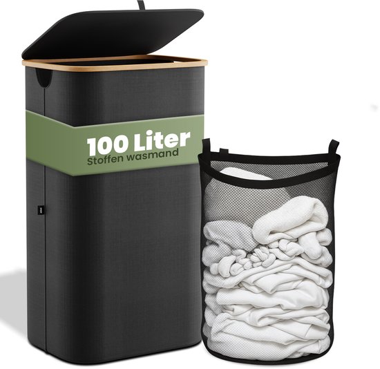Panier à linge foncé rectangulaire de 100 litres avec cadre et couvercle en bambou, avec un sac à linge noir rempli de linge à côté.