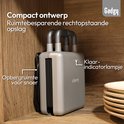 Grijze, gesloten wafelijzer met dubbele handgrepen, opgeborgen in een houten kast. Indicatorlampje is aan.