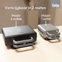 Zwarte en grijze wafelijzers naast elkaar. De zwarte maakt 2 wafels, de grijze maakt 1 wafel.