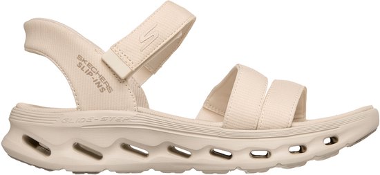 Sandales de couleur naturelle avec fermeture velcro et inscription 'Skechers Slip-ins'.