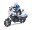 Politieagent op een witte Ducati Scrambler motor met blauwe accenten en zwaailicht.