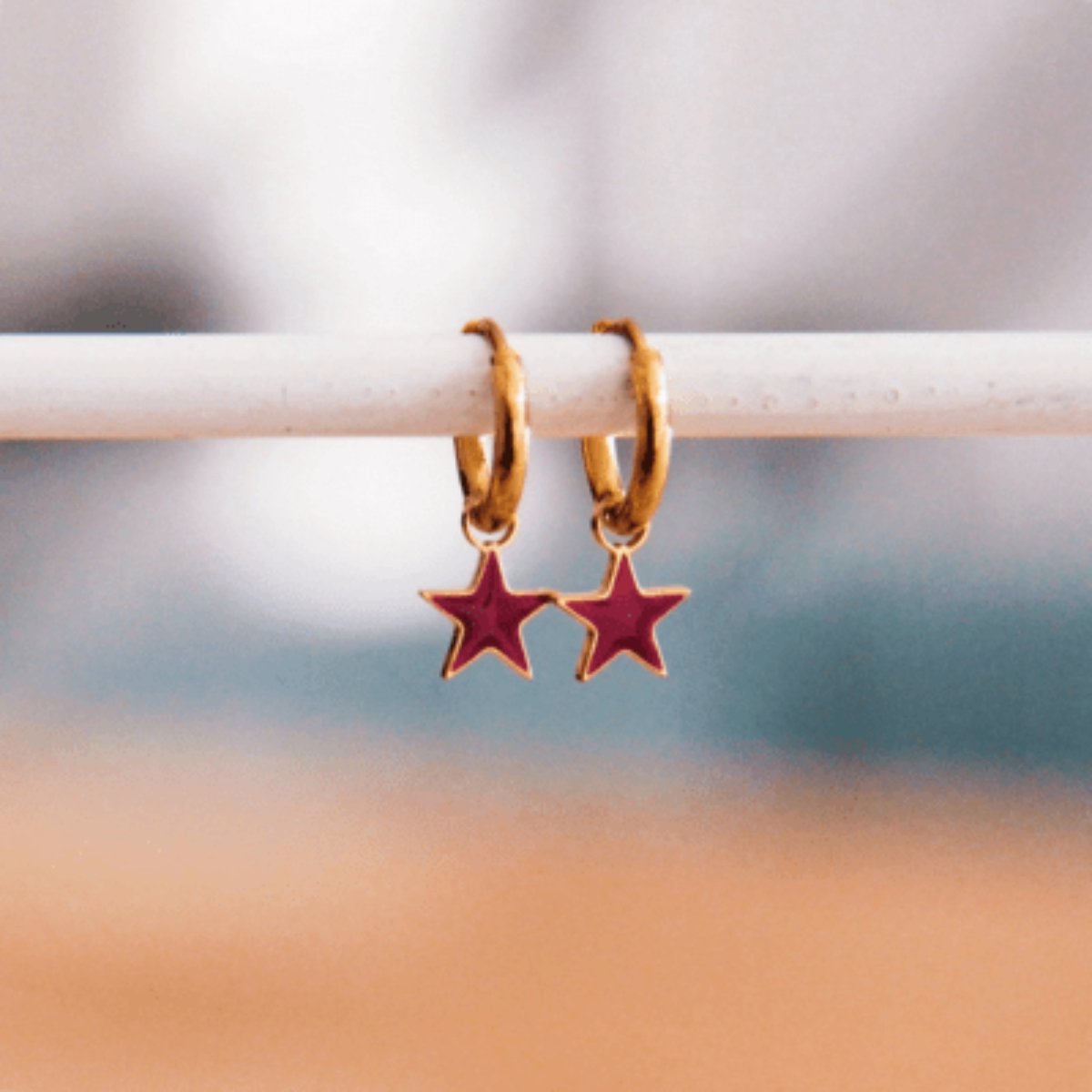Juvana Oorbellen met Mini Ster Paars - Stainless Steel Oorring Goud