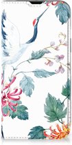 Wallet Bookcase Geschikt voor iPhone 14 Telefoonhoesje Bird Flowers