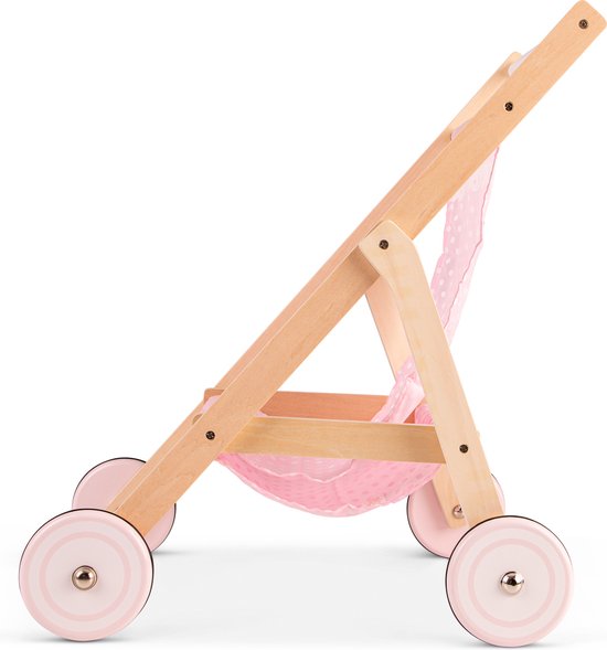 Houten poppenwagen met roze stoffen zitting met witte stippen, zijaanzicht rechts.