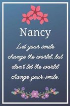 Nancy Let your smile change the world, but don't let the world change your smile.