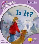 Boek 'Is It?' van Songbirds Phonics met een meisje en een hond.