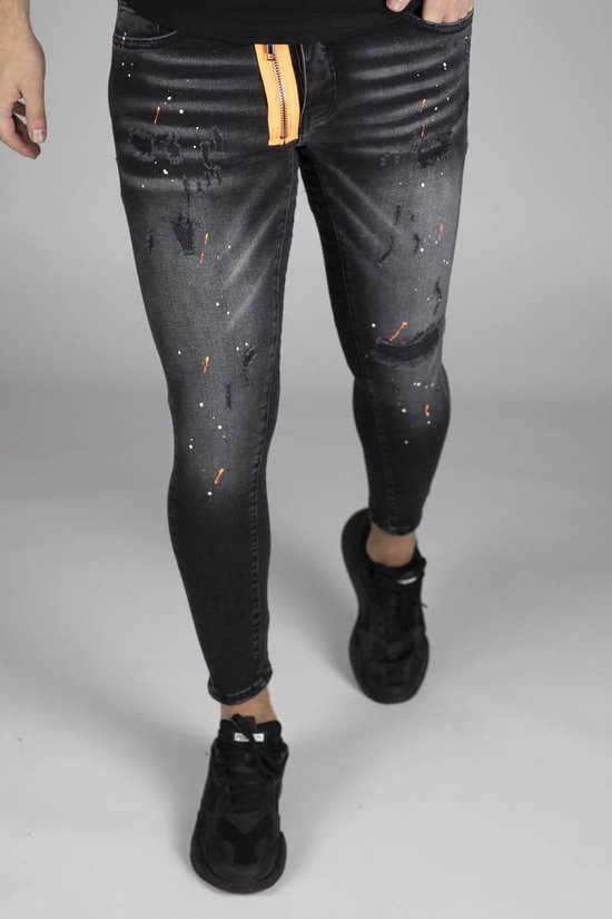 RYMN Jeans skinny zwart met oranje en witte verfvlekken | bol.com