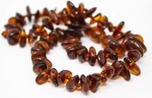 Bruine amberkleurige babyketting met veiligheidssluiting