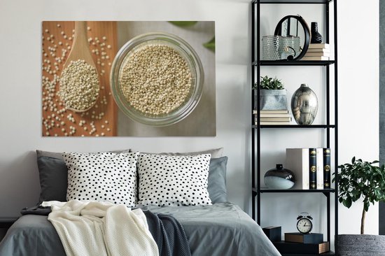 Canvas schilderij 120x80 cm - Wanddecoratie Quinoa in een glazen kom en op een houten lepel - Muurdecoratie woonkamer - Slaapkamer decoratie - Kamer accessoires - Schilderijen op canvas