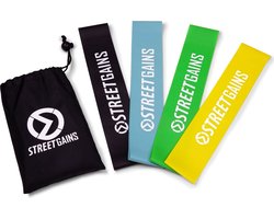 StreetGains® Mini Bands Set – 4 Rubberen Booty Bands (Light, Medium, Strong, Extreme) – Duurzaam Latex Rubber voor Krachttraining, Warming-up en Revalidatie – Inclusief Opbergtasje