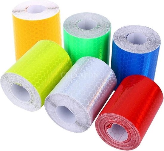 Zes rollen reflecterende tape in de kleuren geel, groen, blauw, rood en wit met honingraatpatroon.