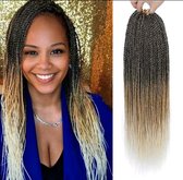 Mooie natuurlijk uitstralende haarbundel 30 vlechtjes 60cm lang haarextensions donker bruin met blondoor invlechten van uw haar zonder clipjes.