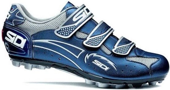 Blauwe Sidi MTB fietsschoen met drie klittenbandsluitingen en zilverkleurige logo's.