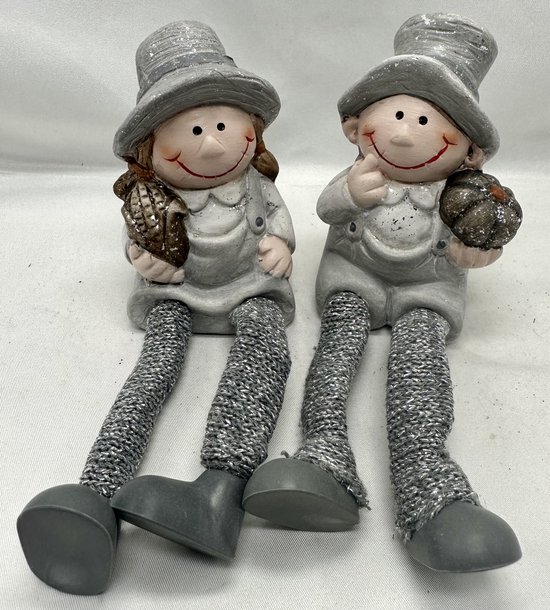 Kerstbeeldjes Meisje + jongen met beentjes - Set van 2 stuks - wit + grijs & glitters - Keramiek - hoogte 11x7x7cm - Kerstdecoratie - Woonaccessoires