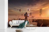 Behang - Fotobehang Een astronaut op Mars - Breedte 600 cm x hoogte 400 cm