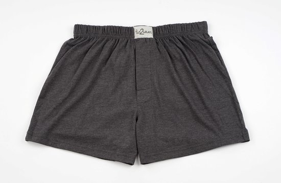 Donkergrijze, wijde boxershort voor heren met elastische tailleband en knoop.
