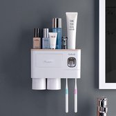 Supremium Tandenborstelhouder Multifunctioneel -  Automatische Tandpasta Dispenser - Ruimtebesparend - Anti-slip - 2 Bekers - Roze