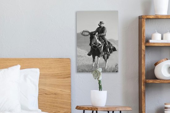 Peinture sur toile Un cow-boy sur un cheval gris ciel - noir et blanc - 20x30 cm - Décoration murale