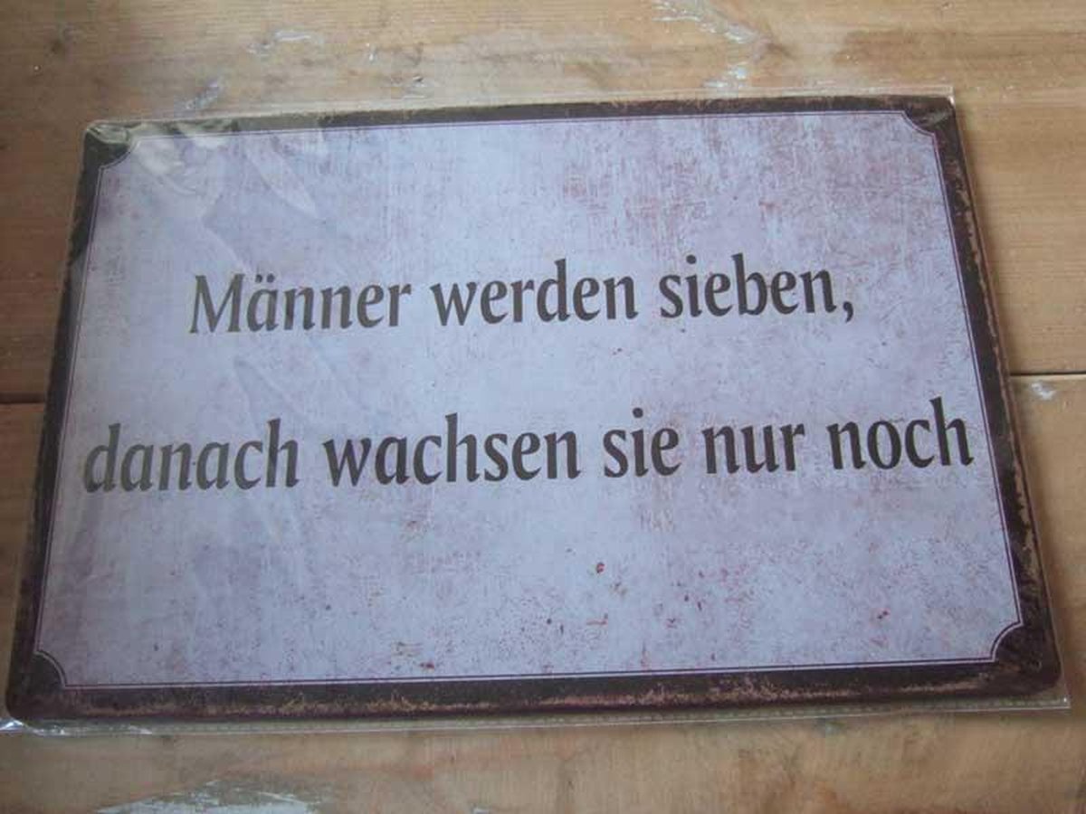 metalen tekstbord männer werden..