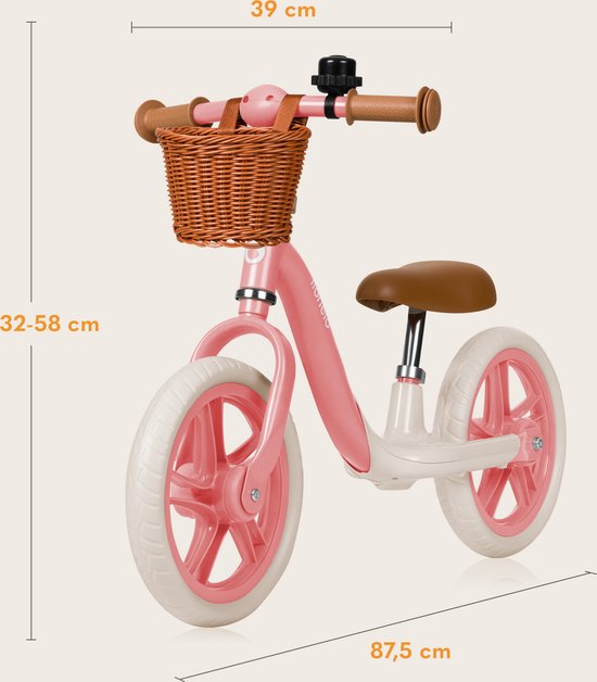Roze loopfiets met bruin zadel, rotan mandje, met afmetingen aangegeven.
