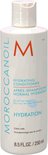 Witte Moroccanoil Hydrating Conditioner fles met oranje M-logo. Tekst in Engels, Frans.