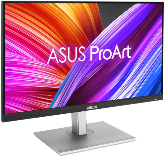 ASUS ProArt monitor in een schuin aanzicht, met levendige schermachtergrond en zilverkleurige standaard.