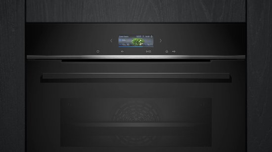 Zwarte Siemens inbouwoven met digitaal display en bedieningsknoppen.