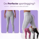 Grijze sportlegging met hoge taille, naadloze afwerking en push-up effect op de billen. Ook in roze, zwart en wit.