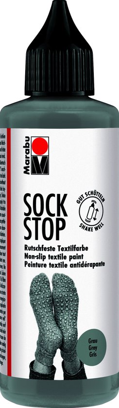 Peinture textile Marabu Sock Stop grise, avec un flacon et une paire de chaussettes grises.