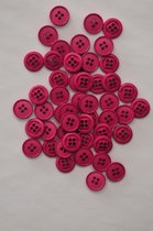 Mooie donker rose 4 gaats knoop. Doorsnede 18 mm. Zakje van 50 stuks.