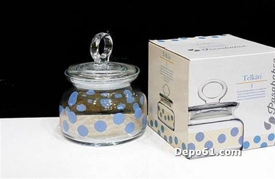 Glazen voorraadpot met blauwe polkadots, een ringvormig handvat en een bijpassende doos.