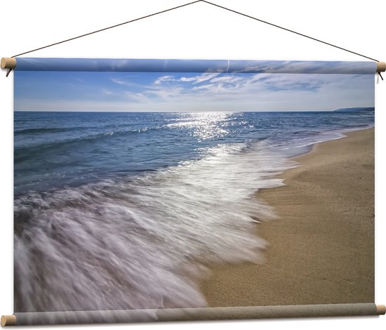 Textielposter - Zee - Strand - Zand - Golven - Schuim - 90x60 cm Foto op Textiel
