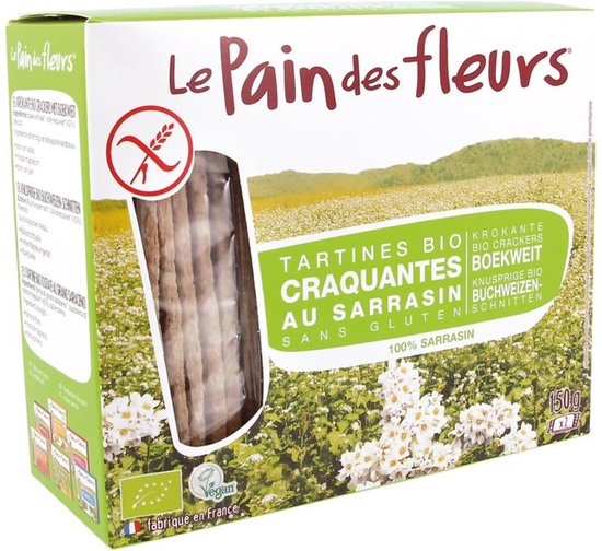 Le Pain des Fleurs glutenvrije boekweit crackers op een groen veld met bloemen en planten. "Farine 100% Sarrasin".