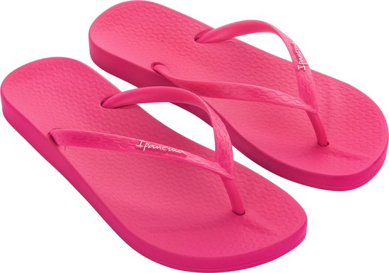 Fuchsia Ipanema teenslippers met patroon op de zool.