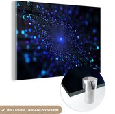 MuchoWow® Glasschilderij 120x80 cm - Schilderij acrylglas - Blauwe gloed van een bloem - Foto op glas - Schilderijen