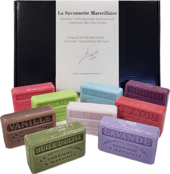 Een geschenkdoos met negen kleine, kleurrijke stukken Marseillezeep met verschillende geuren.