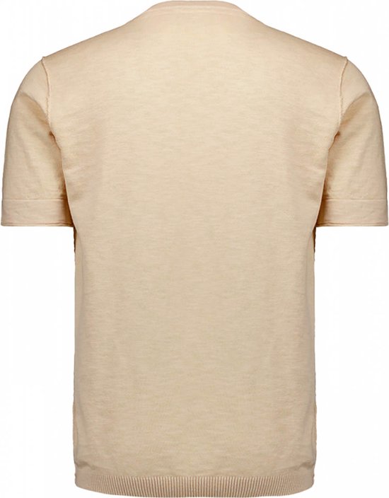 Dos d'un haut tricoté beige à manches courtes.