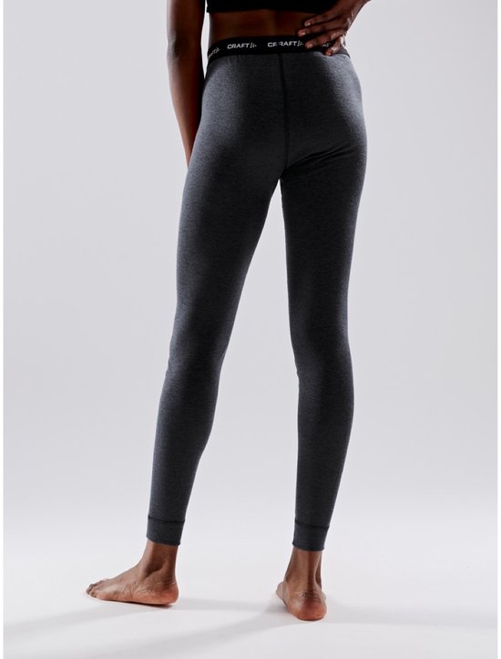 Donkergrijze thermobroek van achteren gezien, met elastische tailleband met 'CRAFT' logo.