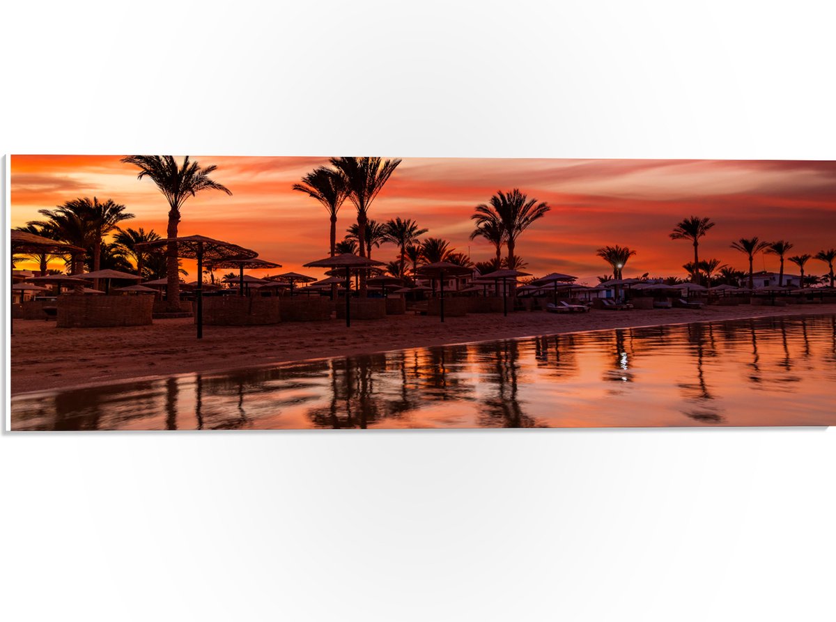PVC Schuimplaat- Strand - Zee - Zonsondergang - Parasols - Palmbomen - 60x20 cm Foto op PV