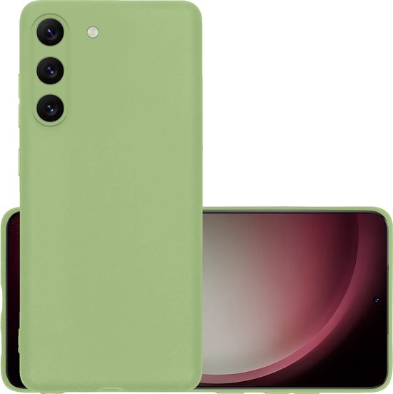 Coque de téléphone vert clair à côté d'un smartphone avec écran rose.