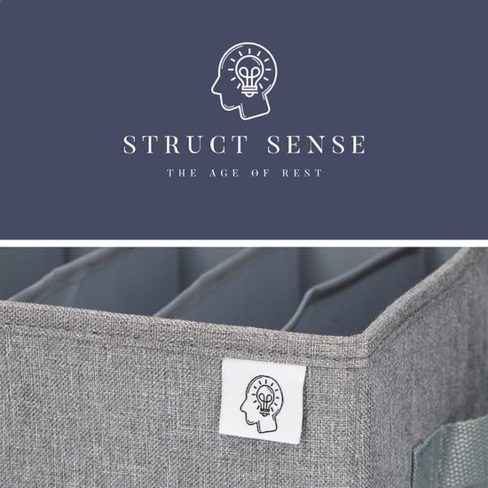 Gros plan sur une boîte de rangement grise en tissu avec le logo Struct Sense sur l'étiquette.