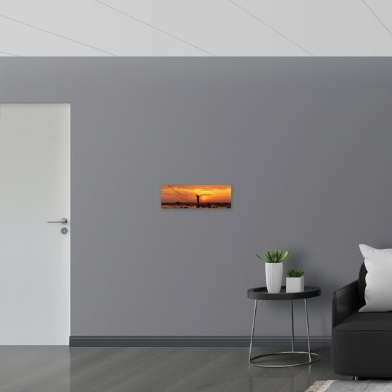 Dibond - Vissersman met Groot Net in Moerassig Landschap bij Zonsondergang - 60x20 cm Foto op Aluminium (Wanddecoratie van metaal)