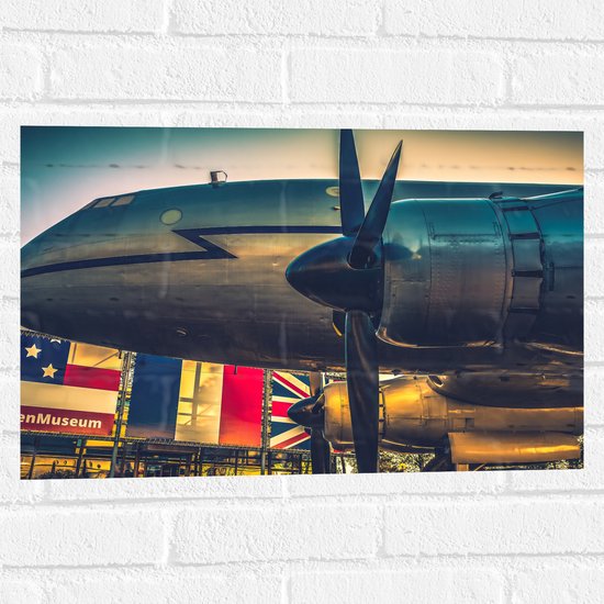 WallClassics - Muursticker - Zijkanten van Vliegtuigen - 60x40 cm Foto op Muursticker