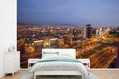 Behang - Fotobehang Luchtfoto van Lima in de avond - Breedte 420 cm x hoogte 280 cm
