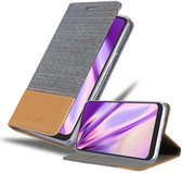 Cadorabo Hoesje geschikt voor LG K40S in LICHTGRIJS BRUIN - Beschermhoes met magnetische sluiting, standfunctie en kaartvakje Book Case Cover Etui