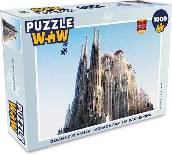 Boîte d'un puzzle de 1000 pièces représentant une vue latérale de la Sagrada Familia à Barcelone. Contient 1000 pièces.