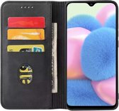 Smartphonica Samsung Galaxy A30s kunstleren hoesje met magnetische sluiting en pashouders book case - zwart / Kunstleer / Book Case geschikt voor Samsung Galaxy A30s
